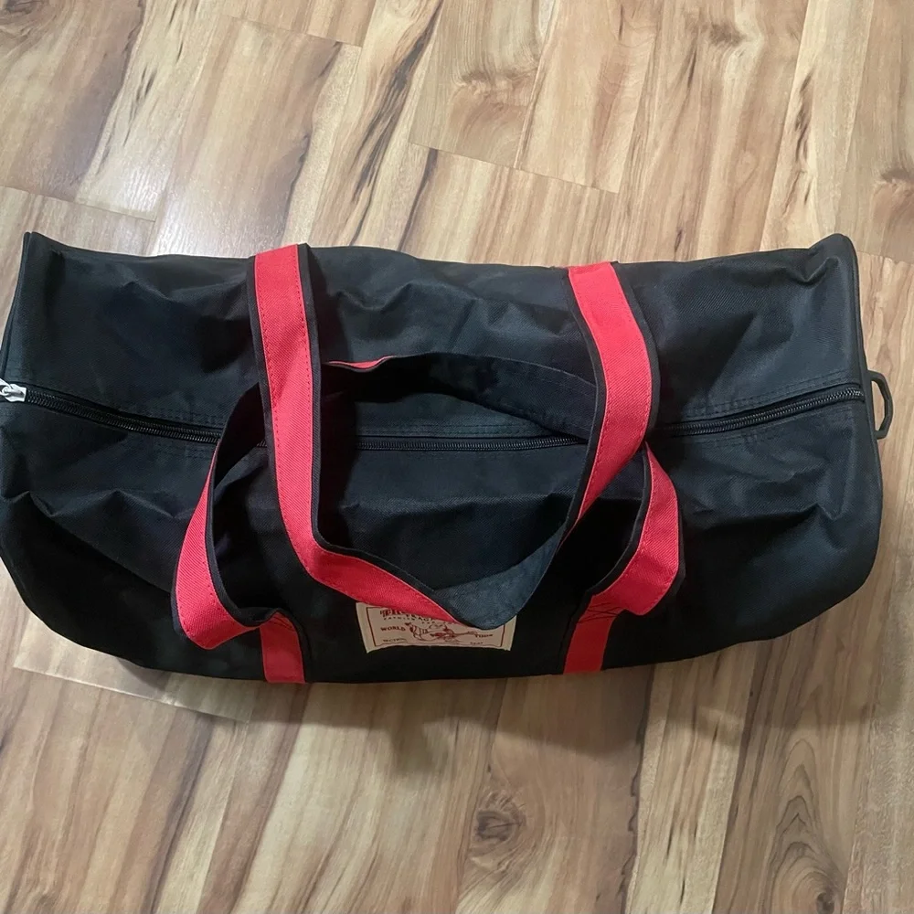 True Religion Black Travel Bag with Red Straps